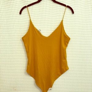 Mustard colored tank
